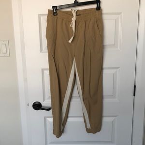 Cream and white jogger style slacks